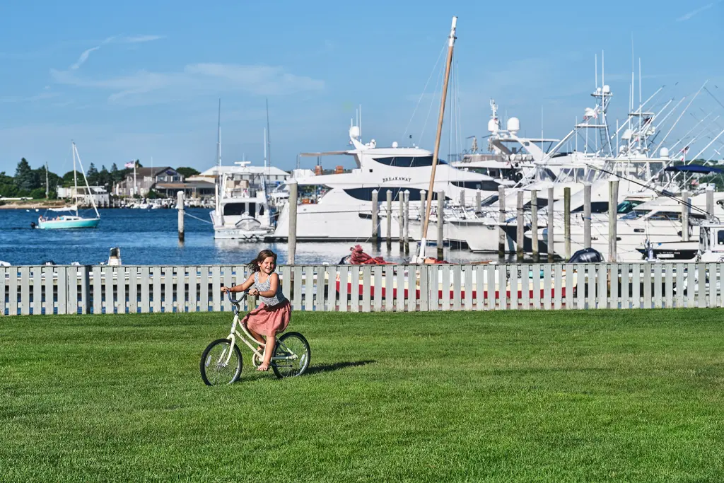 kid riding bike on Great Lawn