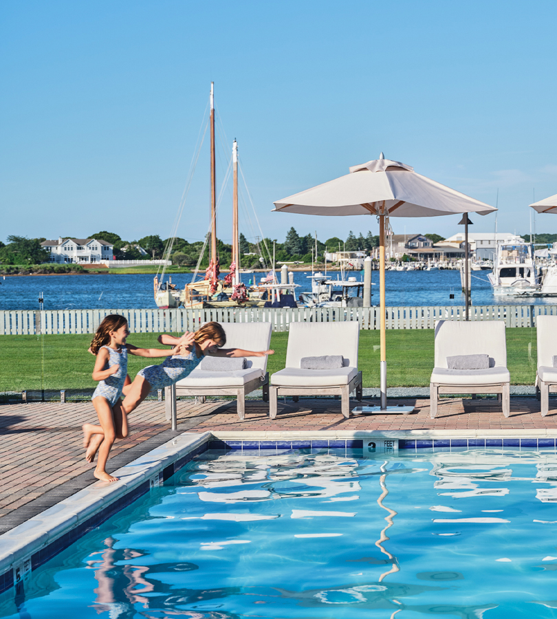 great lawn pool kids jumping in water