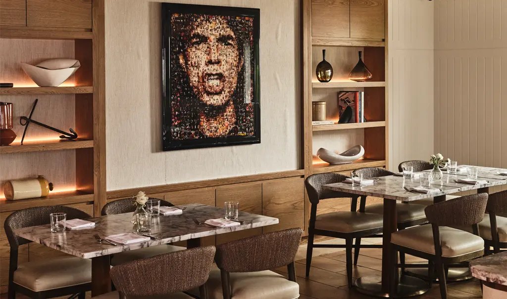 private dining room tables with Mick Jagger photo in the back